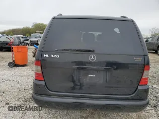 2000 Mercedes-Benz M 320/430/500 z VIN 4JGAB54E3YA209798, wystawiony jako Copart lot #52116575 z przebiegiem Nie podano mil oraz Szkoda całkowita • Salvage title. Historia ofert i sprzedaży dostępna na DreamBid. Obrazek 6.