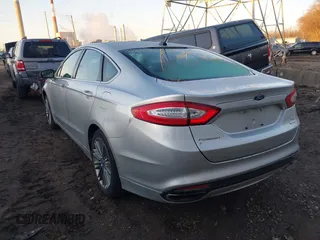 2013 Ford Fusion SE z VIN 3FA6P0H96DR268474, wystawiony jako IAAI lot #41757472 z przebiegiem 159 529 mil mil oraz . Historia ofert i sprzedaży dostępna na DreamBid. Obrazek 3.