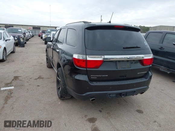 2011 Dodge Durango Citadel with VIN 1D4SE5GTXBC695700, listed as a IAAI auction lot 41381731 with 152,055 mi miles. Bid and sale history available at carsss.com. Image 3.