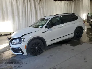 2021 Volkswagen Tiguan SE with VIN 3VV2B7AXXMM119198, listed as a Copart auction lot 77263904 with 40,725 mi miles and Salvage title. Bid and sale history available at DreamBid. Image 1.