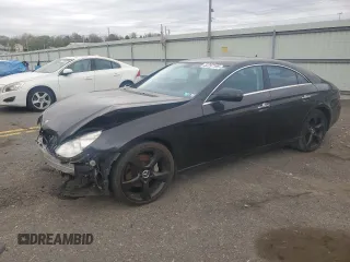2009 Mercedes-Benz CLS-Class 5.5L with VIN WDDDJ72X99A142572, listed as a Copart auction lot 52297195 with 87,520 mi miles and Salvage Title. Bid and sale history available at carsss.com. Image 1.