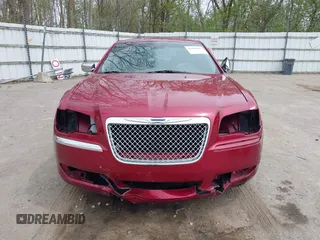2012 Chrysler 300 C with VIN 2C3CCAKTXCH220185, listed as a IAAI auction lot 42110327 with 57,682 mi miles and . Bid and sale history available at DreamBid. Image 12.