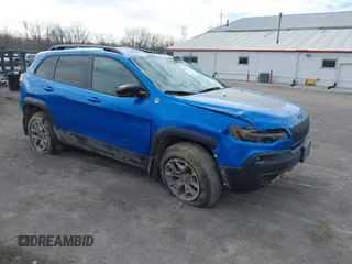 2022 Jeep Cherokee Trailhawk z VIN 1C4PJMBX1ND539319, wystawiony jako IAAI lot #41811178 z przebiegiem 49 922 mil mil oraz . Historia ofert i sprzedaży dostępna na DreamBid. Obrazek 1.