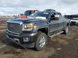 2015 GMC Sierra 3500HD Denali z VIN 1GT424E87FF550657, wystawiony jako Copart lot #41462145 z przebiegiem 143 673 mil mil oraz Szkoda całkowita • Salvage title. Historia ofert i sprzedaży dostępna na DreamBid. Obrazek 1.