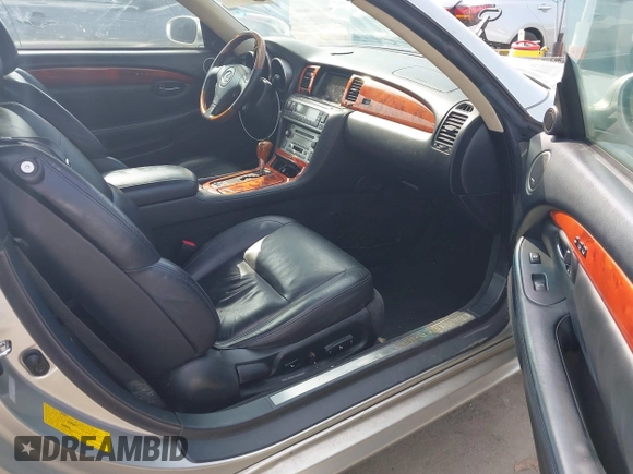 2002 Lexus SC 430 z VIN JTHFN48Y520017410, wystawiony jako IAAI lot #42408170 z przebiegiem 149 875 mil mil oraz . Historia ofert i sprzedaży dostępna na DreamBid. Obrazek 5.