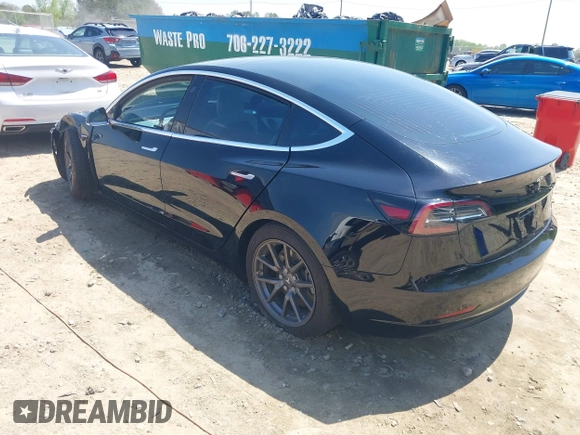2018 Tesla Model 3 Long Range Battery with VIN 5YJ3E1EB1JF122786, listed as a IAAI auction lot 42010451 with 85,510 mi miles and . Bid and sale history available at DreamBid. Image 3.