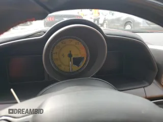 2014 Ferrari 458 Italia z VIN ZFF68NHA7E0202940, wystawiony jako Copart lot #74242784 z przebiegiem Nie podano mil oraz Nie do naprawy. Historia ofert i sprzedaży dostępna na DreamBid. Obrazek 9.