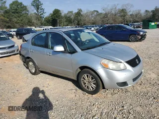 2012 Suzuki SX4 LE with VIN JS2YC5A38C6302644, listed as a Copart auction lot 45696145 with 162,691 mi miles and Salvage Title. Bid and sale history available at DreamBid. Image 4.