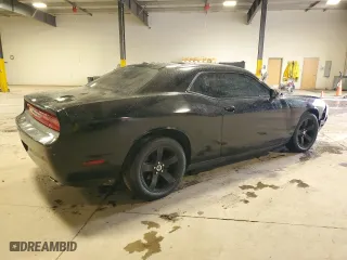 2013 Dodge Challenger SXT with VIN 2C3CDYAG5DH725000, listed as a Copart auction lot 82157004 with 188,278 mi miles and Salvage Title. Bid and sale history available at carsss.com. Image 3.