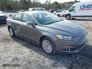 2014 Ford Fusion Energi Titanium with VIN 3FA6P0SUXER216960, listed as a IAAI auction lot 41339413 with 85,025 mi miles. Bid and sale history available at carsss.com. Image 1.