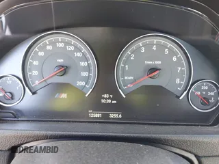 2015 BMW M4 with VIN WBS3R9C58FK334247, listed as a IAAI auction lot 41940211 with 125,881 mi miles. Bid and sale history available at carsss.com. Image 7.
