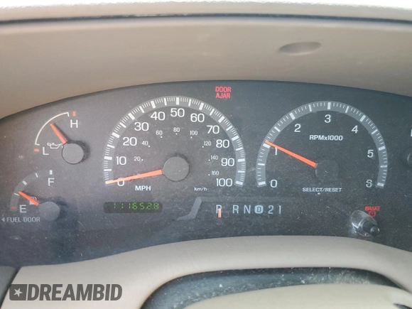 1999 Ford Expedition XLT z VIN 1FMPU18L0XLC03675, wystawiony jako Copart lot #56721435 z przebiegiem 111 652 mil mil oraz Szkoda całkowita • Salvage title. Historia ofert i sprzedaży dostępna na DreamBid. Obrazek 9.