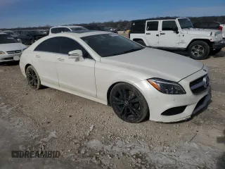 2016 Mercedes-Benz CLS 400 with VIN WDDLJ6FB8GA161891, listed as a Copart auction lot 87276124 with 93,133 mi miles and Salvage title. Bid and sale history available at DreamBid. Image 4.