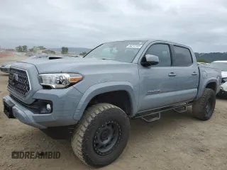2018 Toyota Tacoma SR with VIN 3TMCZ5AN0JM187541, listed as a Copart auction lot 54212155 with 69,197 mi miles and Salvage Title. Bid and sale history available at carsss.com. Image 1.