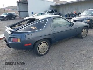 1982 Porsche 928 z VIN WP0JA0926CS821506, wystawiony jako IAAI lot #41903954 z przebiegiem 64 814 mil mil oraz . Historia ofert i sprzedaży dostępna na DreamBid. Obrazek 4.