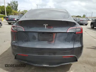 2025 Tesla Model Y Long Range with VIN 7SAYGDED6SF228626, listed as a Copart auction lot 47654525 with 2,087 mi miles and Salvage Title. Bid and sale history available at DreamBid. Image 6.