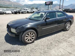 2008 Chrysler 300 Touring with VIN 2C3KA53G78H119266, listed as a Copart auction lot 58944575 with 165,070 mi miles and Salvage title. Bid and sale history available at DreamBid. Image 1.