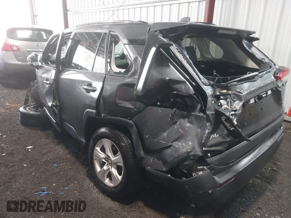 2021 Toyota RAV4 XLE with VIN 2T3W1RFVXMW117830, listed as a IAAI auction lot 41865708 with 94,990 mi miles. Bid and sale history available at carsss.com. Image 6.