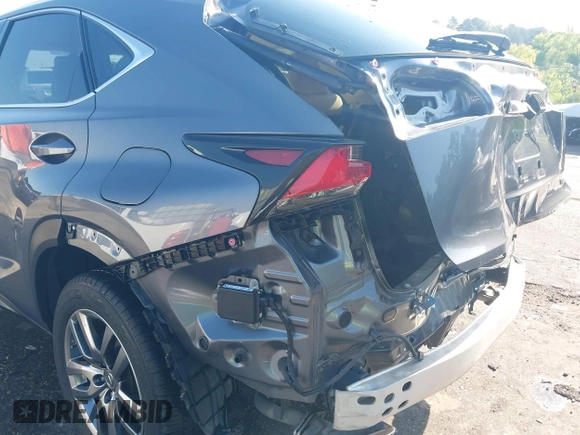 2015 Lexus NX 200t with VIN JTJYARBZXF2012036, listed as a IAAI auction lot 42085466 with 127,325 mi miles and . Bid and sale history available at DreamBid. Image 18.