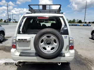 2004 Suzuki XL7 LX with VIN JS3TX92V444107106, listed as a Copart auction lot 62322035 with 94,380 mi miles and Salvage title. Bid and sale history available at DreamBid. Image 6.
