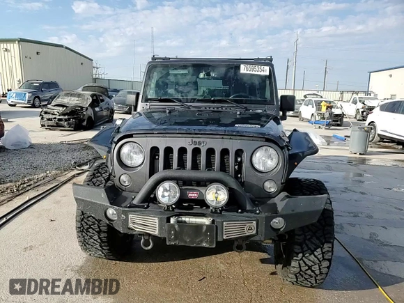2018 Jeep Wrangler JK Unlimited Sport S with VIN 1C4BJWDG8JL812324, listed as a Copart auction lot 76595354 with 140,013 mi miles and Salvage Title. Bid and sale history available at carsss.com. Image 14.