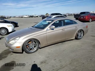 2006 Mercedes-Benz CLS 500 with VIN WDDDJ75X06A037295, listed as a Copart auction lot 77282044 with 171,291 mi miles and Clean Title. Bid and sale history available at DreamBid. Image 1.