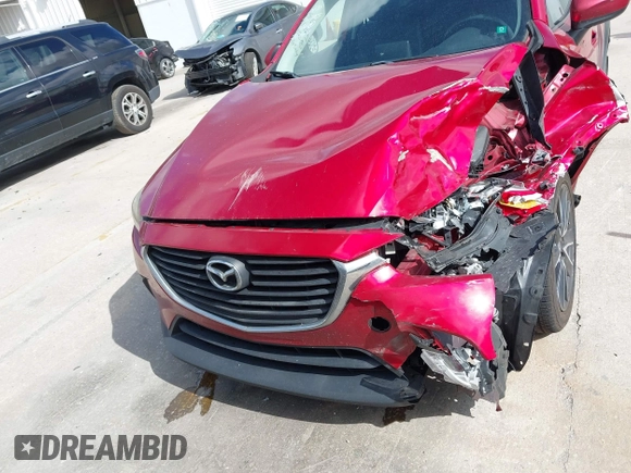 2018 Mazda CX-3 Touring with VIN JM1DKDC7XJ0318219, listed as a IAAI auction lot 41941104 with 86,186 mi miles. Bid and sale history available at carsss.com. Image 12.
