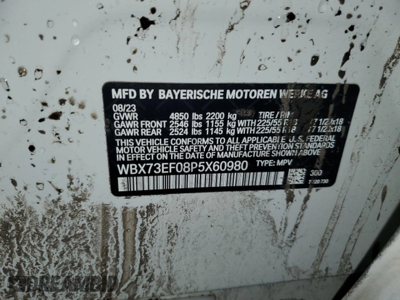 2023 BMW X1 xDrive28i with VIN WBX73EF08P5X60980, listed as a Copart auction lot 59899385 with 21,975 mi miles and Salvage title. Bid and sale history available at DreamBid. Image 14.