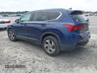 2021 Hyundai Santa Fe SE with VIN 5NMS14AJ2MH323542, listed as a IAAI auction lot 42182576 with 69,385 mi miles and . Bid and sale history available at DreamBid. Image 3.