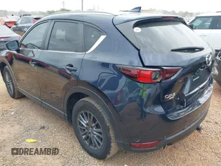 2020 Mazda CX-5 Touring with VIN JM3KFBCM9L0741535, listed as a IAAI auction lot 42101763 with 54,004 mi miles and . Bid and sale history available at DreamBid. Image 3.