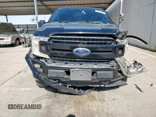2019 Ford F-150 XL with VIN 1FTEW1EP2KFC25018, listed as a Copart auction lot 63105465 with 60,331 mi miles and Salvage title. Bid and sale history available at DreamBid. Image 5.
