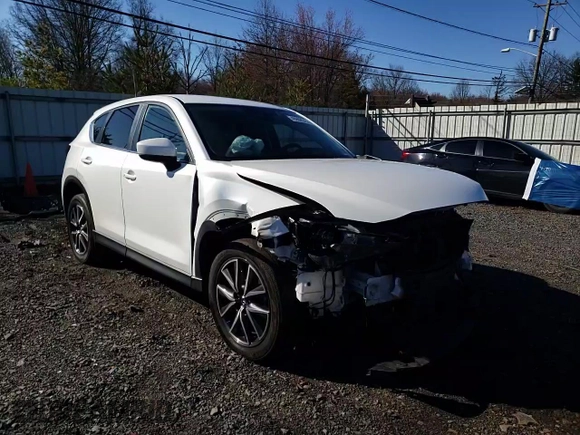 2018 Mazda CX-5 Touring with VIN JM3KFBCM3J0437422, listed as a Copart auction lot 49909575 with 0 mi miles and Salvage Title. Bid and sale history available at carsss.com. Image 12.