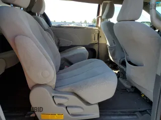 2014 Toyota Sienna LE with VIN 5TDJK3DC5ES093932, listed as a Copart auction lot 63611985 with 142,044 mi miles and Salvage title. Bid and sale history available at DreamBid. Image 11.