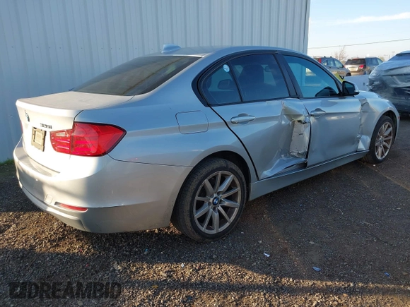 2013 BMW 3 Series 320i with VIN WBA3B1C53DK128079, listed as a IAAI auction lot 41316846 with 138,559 mi miles. Bid and sale history available at carsss.com. Image 4.