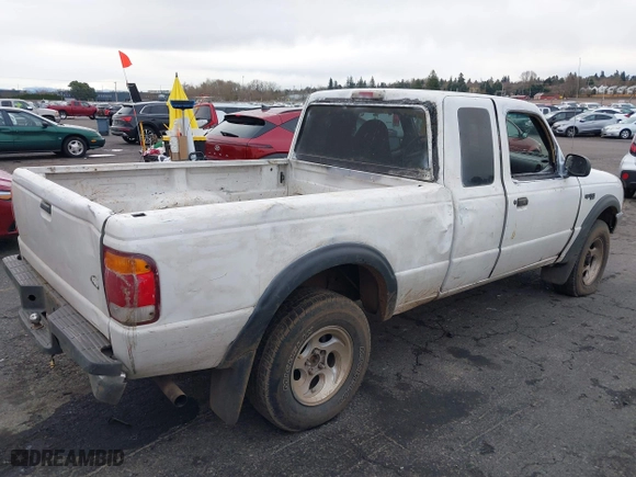 1999 Ford Ranger XLT with VIN 1FTZR15XXXTA09502, listed as a IAAI auction lot 41794904 with 203,276 mi miles. Bid and sale history available at carsss.com. Image 6.