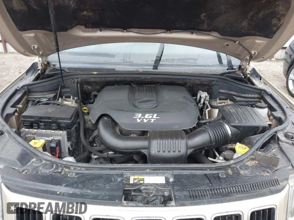 2014 Jeep Grand Cherokee Laredo with VIN 1C4RJEAG5EC424244, listed as a IAAI auction lot 41608821 with 156,251 mi miles and . Bid and sale history available at DreamBid. Image 6.