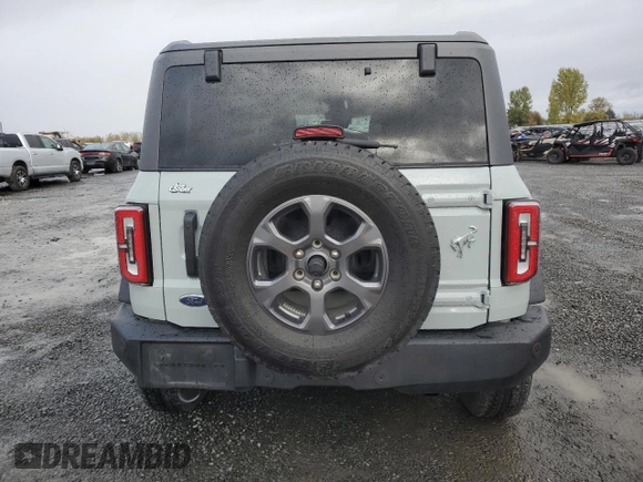 2023 Ford Bronco with VIN 1FMDE5BH3PLA89022, listed as a Copart auction lot 78643144 with 33,095 mi miles and Salvage Title. Bid and sale history available at DreamBid. Image 6.