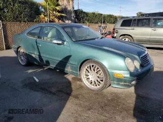 2000 Mercedes-Benz CLK 320/430 with VIN WDBLJ65G5YF150048, listed as a Copart auction lot 86574904 with 183,709 mi miles and Clean Title. Bid and sale history available at DreamBid. Image 4.
