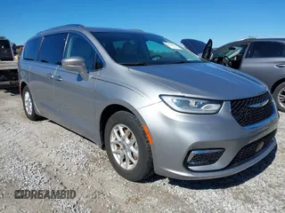 2021 Chrysler Pacifica Touring L with VIN 2C4RC1BG3MR560234, listed as a IAAI auction lot 40926673 with 27,830 mi miles and . Bid and sale history available at DreamBid. Image 1.