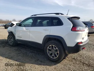 2022 Jeep Cherokee Trailhawk с VIN 1C4PJMBX3ND549057, выставлен на аукционе Copart как лот 48959915 с пробегом 21 381 миль миль и Списание • Salvage title. История ставок и продаж доступна на DreamBid. Изображение 2.