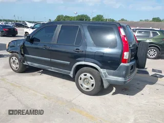 2005 Honda CR-V LX with VIN JHLRD78535C031868, listed as a IAAI auction lot 42002372 with 201,258 mi miles. Bid and sale history available at carsss.com. Image 3.