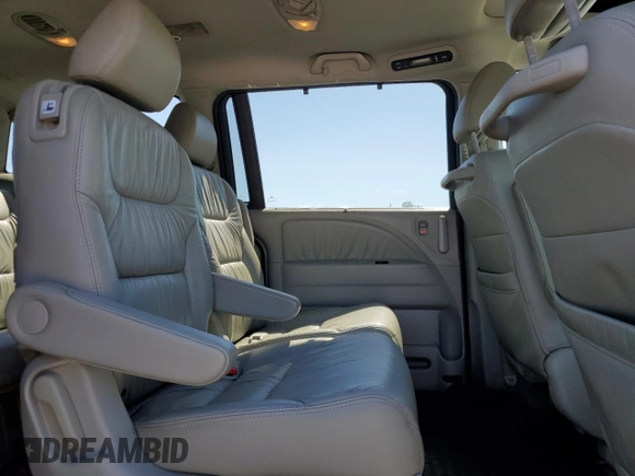 2010 Honda Odyssey EX-L с VIN 5FNRL3H75AB054835, выставлен на аукционе Copart как лот 56779865 с пробегом 121 546 миль миль и Чистый • Clean title. История ставок и продаж доступна на DreamBid. Изображение 11.