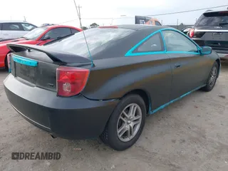 2003 Toyota Celica GT with VIN JTDDR32T830144240, listed as a IAAI auction lot 41602414 with 213,521 mi miles. Bid and sale history available at carsss.com. Image 4.