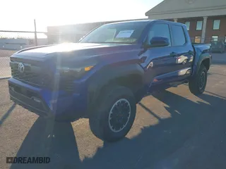 2024 Toyota Tacoma 4WD SR5 with VIN 3TYLB5JN3RT028338, listed as a IAAI auction lot 41870958 with 2,249 mi miles. Bid and sale history available at carsss.com. Image 18.