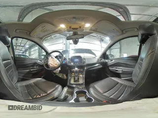 2015 Ford Escape Titanium with VIN 1FMCU9J96FUA43340, listed as a Copart auction lot 55756395 with 142,039 mi miles and Salvage Title. Bid and sale history available at DreamBid. Image 15.