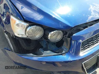 2012 Chevrolet Sonic LT with VIN 1G1JC6SB4C4188119, listed as a IAAI auction lot 42616201 with 70,675 mi miles and . Bid and sale history available at DreamBid. Image 12.