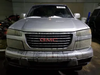 2010 GMC Canyon z VIN 1GTJTFDE0A8105967, wystawiony jako Copart lot #42169555 z przebiegiem 230 257 mil mil oraz Czysty tytuł • Clean title. Historia ofert i sprzedaży dostępna na DreamBid. Obrazek 5.