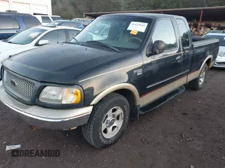 1999 Ford F-150 XL with VIN 1FTRX17L1XNB98741, listed as a IAAI auction lot 41113649 with Not Provided miles. Bid and sale history available at carsss.com. Image 2.
