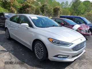 2017 Ford Fusion Titanium with VIN 3FA6P0K90HR266556, listed as a IAAI auction lot 41947924 with 135,628 mi miles. Bid and sale history available at carsss.com. Image 1.