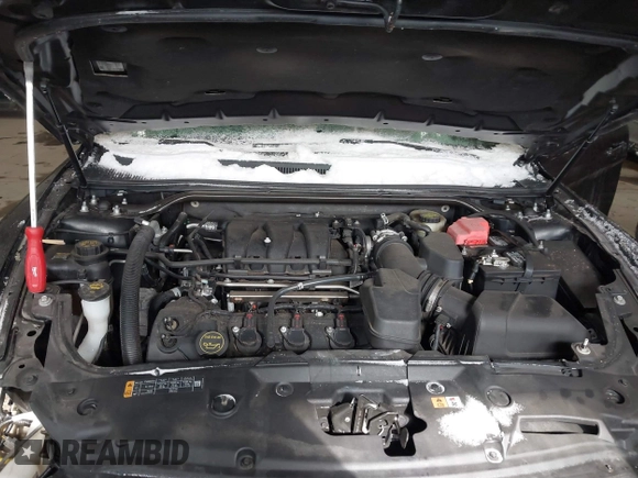 2015 Ford Taurus SEL with VIN 1FAHP2E89FG202589, listed as a IAAI auction lot 41592298 with 105,410 mi miles and . Bid and sale history available at carsss.com. Image 10.
